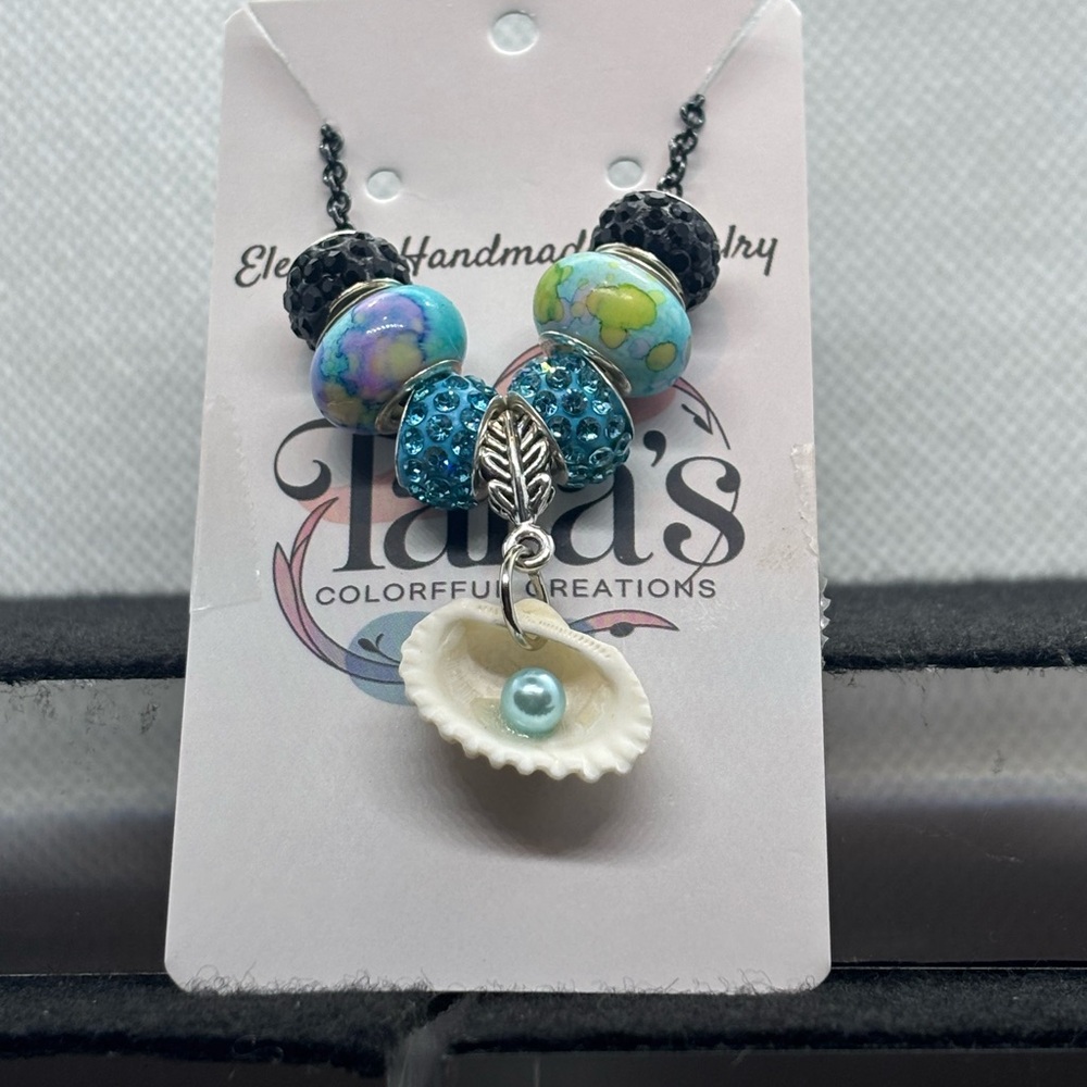Vibrant Blue Beaded Necklace with Shell Pendant